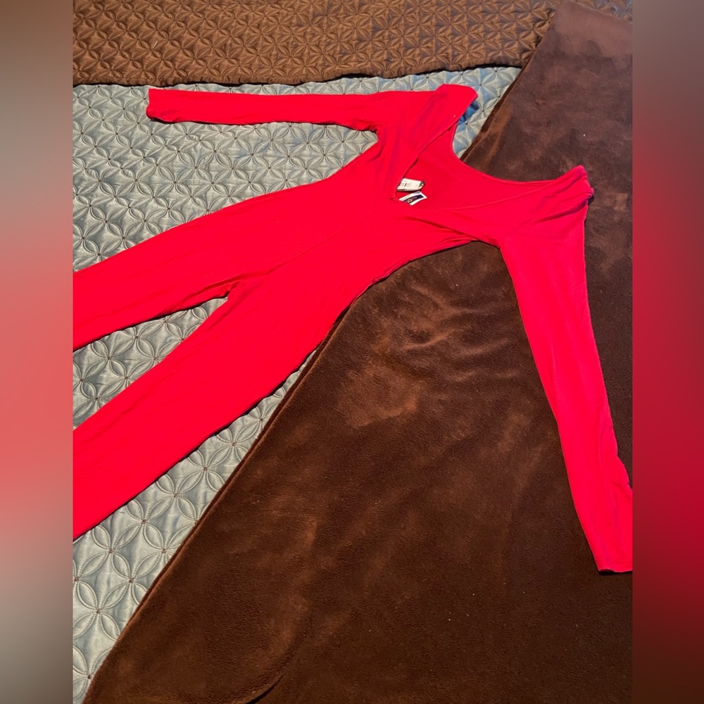 Red body-con romper.